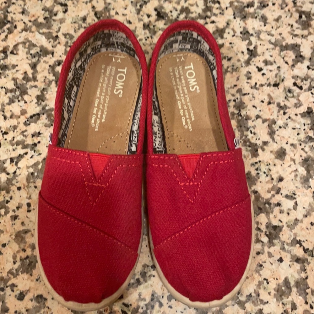 Boys red Tom’s shoes